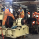 Millwrights moving electrical machinery